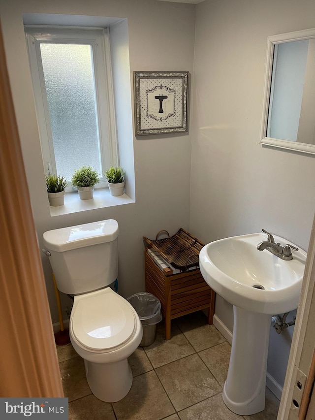 7301 Granite Rd, Elkins Park, PA 19027 - half bath featuring toilet and tile patterned flooring