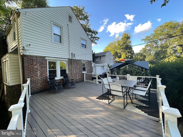 7301 Granite Rd, Elkins Park, PA 19027 - wooden terrace featuring outdoor dining space and a gazebo