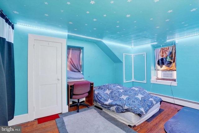 2605 N Sherman St, York, PA 17406 - bedroom with cooling unit, wood finished floors, and a baseboard radiator