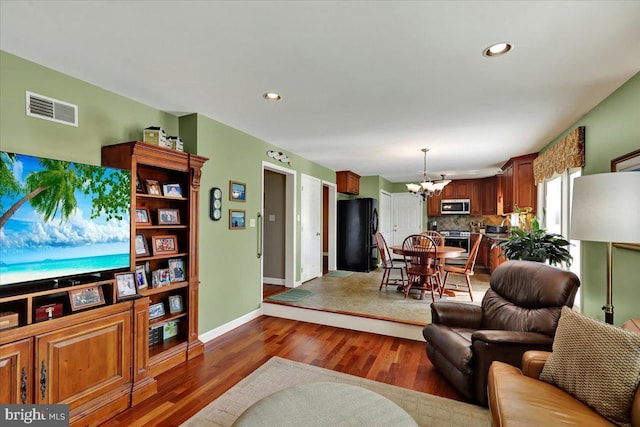 32 Duffield Dr, Lititz, PA 17543 - living area featuring a chandelier, wood finished floors, and recessed lighting