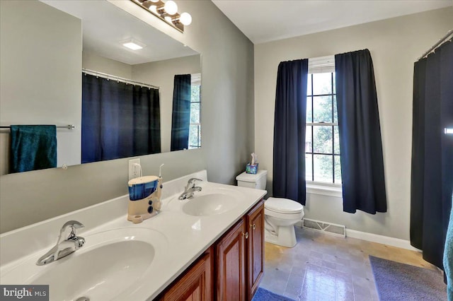 32 Duffield Dr, Lititz, PA 17543 - full bathroom featuring double vanity, healthy amount of natural light, and tile patterned floors