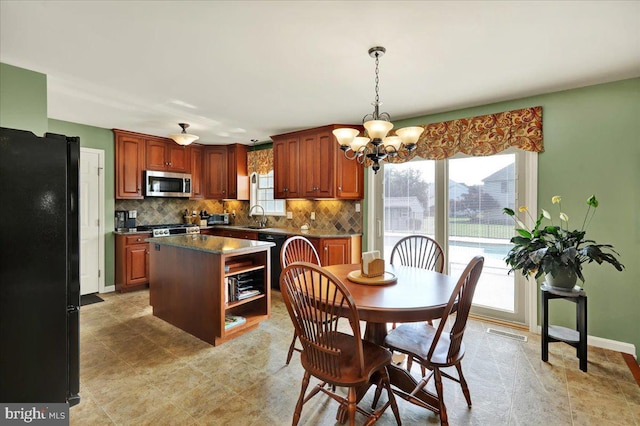 32 Duffield Dr, Lititz, PA 17543 - dining room featuring a chandelier and baseboards