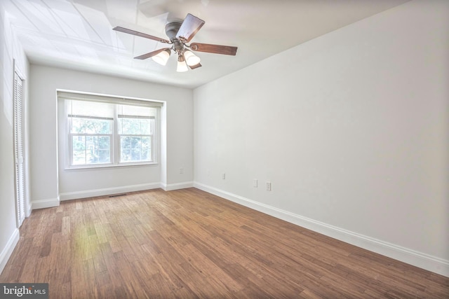 7809 Heatherton Ln, Potomac, MD 20854 - empty room featuring wood finished floors and ceiling fan