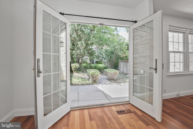 7809 Heatherton Ln, Potomac, MD 20854 - entryway featuring french doors and wood finished floors