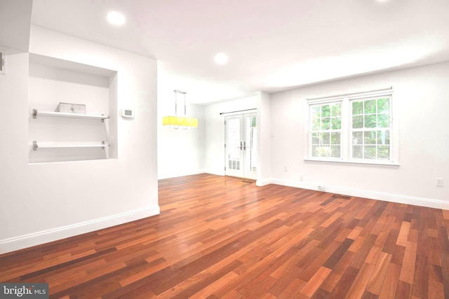 7809 Heatherton Ln, Potomac, MD 20854 - unfurnished room featuring french doors, wood finished floors, and recessed lighting