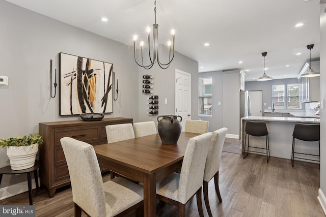 7357 E Walnut Ln, Philadelphia, PA 19138 - dining area featuring light wood finished floors, recessed lighting, and a chandelier