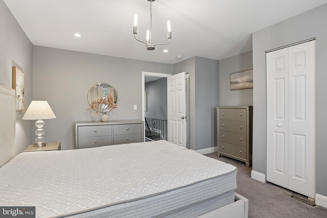 7357 E Walnut Ln, Philadelphia, PA 19138 - bedroom with a chandelier, dark colored carpet, recessed lighting, and a closet
