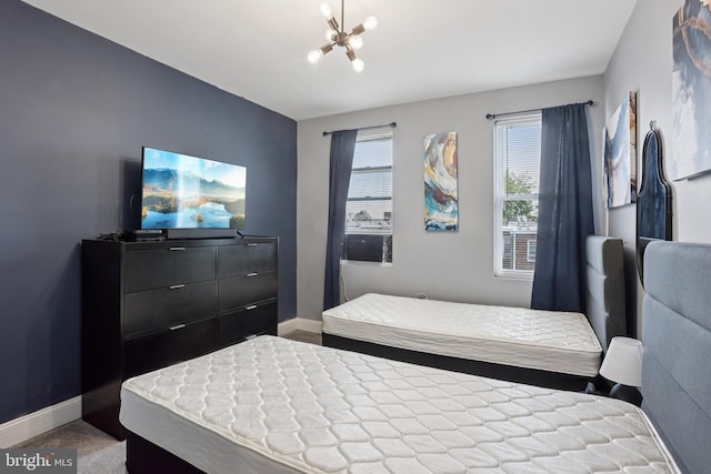 7357 E Walnut Ln, Philadelphia, PA 19138 - carpeted bedroom with a chandelier and baseboards