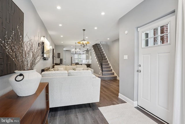 7357 E Walnut Ln, Philadelphia, PA 19138 - living area featuring a chandelier, stairway, dark wood-style floors, and recessed lighting