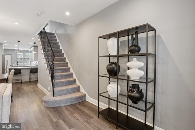 7357 E Walnut Ln, Philadelphia, PA 19138 - stairs featuring wood finished floors and recessed lighting