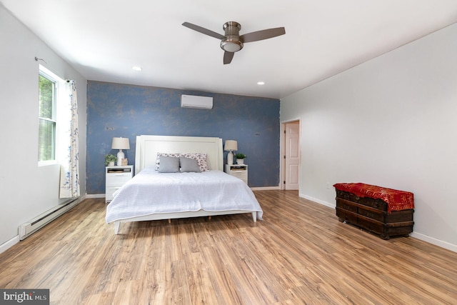 3789 Spring Rd, Carlisle, PA 17013 - bedroom with a baseboard heating unit, a wall unit AC, wood finished floors, ceiling fan, and recessed lighting