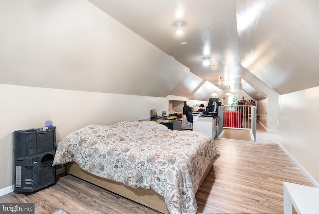 3789 Spring Rd, Carlisle, PA 17013 - bedroom featuring wood finished floors and vaulted ceiling