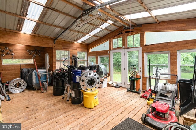 3789 Spring Rd, Carlisle, PA 17013 - misc room featuring wood walls, hardwood / wood-style floors, high vaulted ceiling, and plenty of natural light