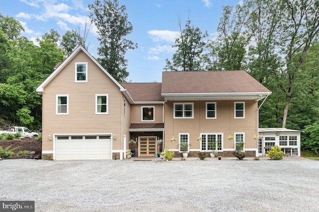 3789 Spring Rd, Carlisle, PA 17013 - view of front of home with driveway, an attached garage, stone siding, and roof with shingles