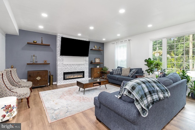 3789 Spring Rd, Carlisle, PA 17013 - living area with a fireplace, recessed lighting, and wood finished floors