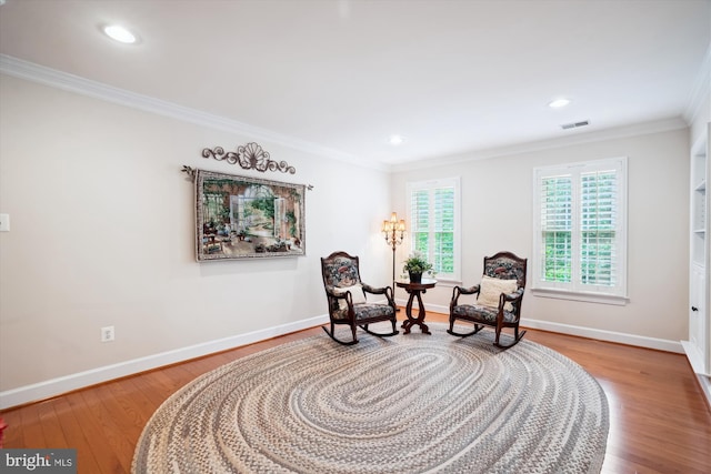 114 Lake St, Gaithersburg, MD 20878 - sitting room with wood finished floors, ornamental molding, and recessed lighting