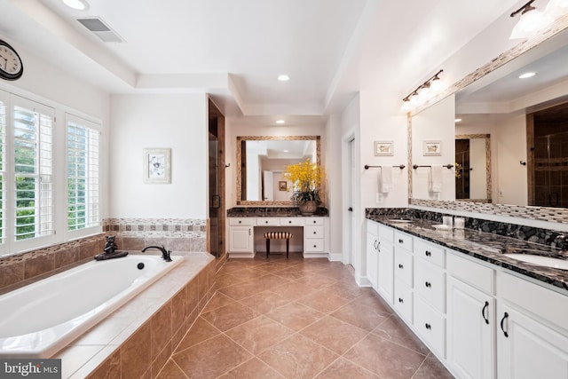 114 Lake St, Gaithersburg, MD 20878 - full bath with double vanity, a garden tub, a shower stall, recessed lighting, and tile patterned flooring