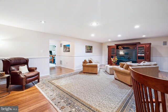 114 Lake St, Gaithersburg, MD 20878 - living area featuring wainscoting, light wood-style flooring, and recessed lighting