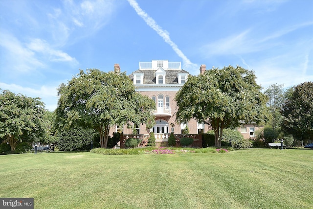 114 Lake St, Gaithersburg, MD 20878 - rear view of property with a chimney, a yard, a high end roof, and mansard roof