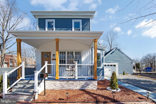 508 Vine St, Palmyra, NJ 08065 - view of front of property with covered porch and a detached garage