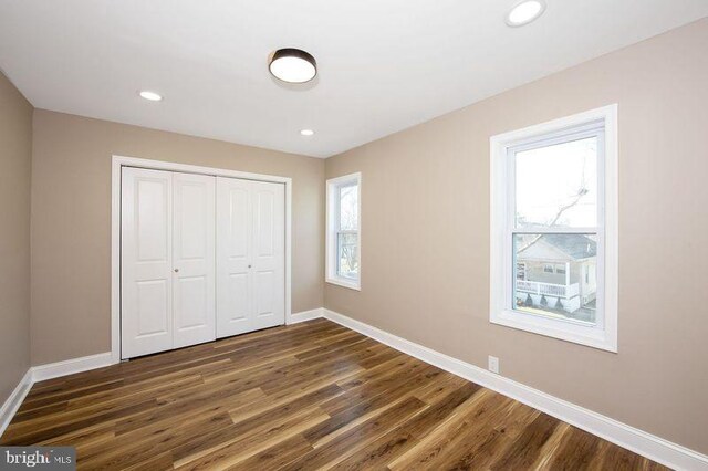 508 Vine St, Palmyra, NJ 08065 - unfurnished bedroom with a closet, wood finished floors, and recessed lighting