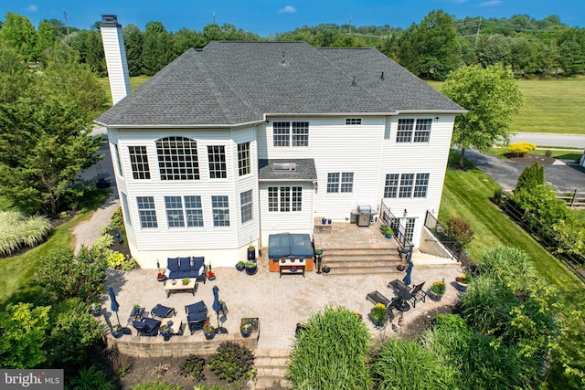 147 Palsgrove Way, Chester Springs, PA 19425 - rear view of house featuring outdoor lounge area, a patio area, a chimney, a shingled roof, and outdoor dining area