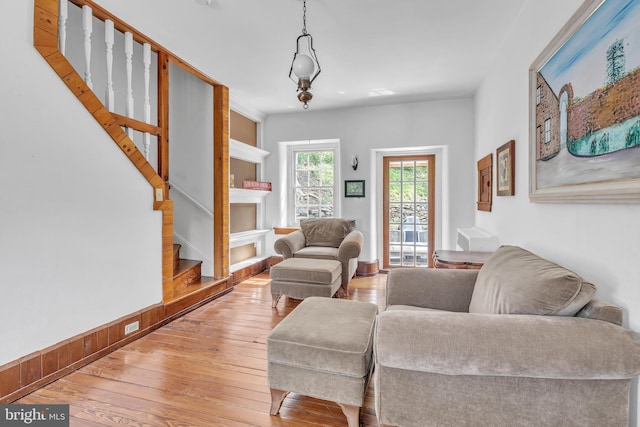 277 W Baltimore Pike, Media, PA 19063 - living room featuring light wood-style flooring and stairs