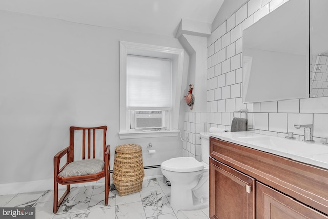 277 W Baltimore Pike, Media, PA 19063 - bathroom featuring vanity, marble look tile flooring, cooling unit, a baseboard radiator, and decorative backsplash
