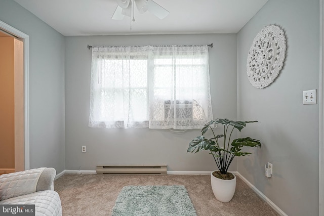 328 Spruce St, Bridgeton, NJ 08302 - living area featuring a baseboard heating unit, carpet flooring, and healthy amount of natural light