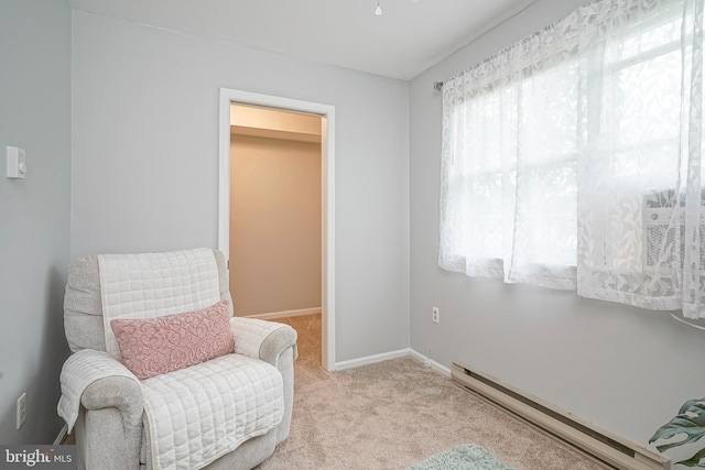 328 Spruce St, Bridgeton, NJ 08302 - sitting room with a baseboard heating unit and carpet
