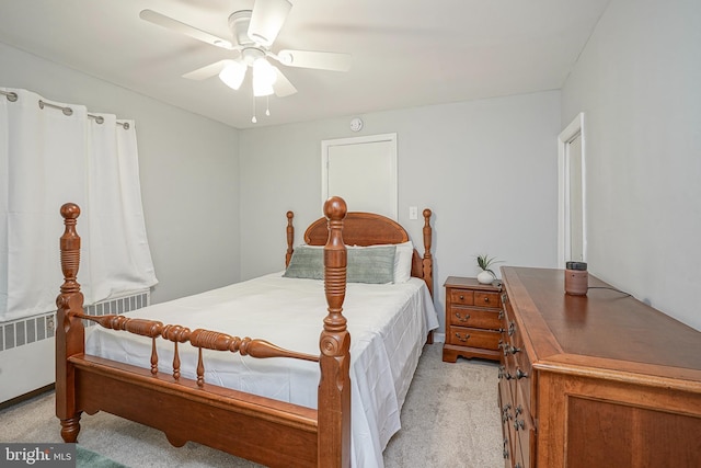 328 Spruce St, Bridgeton, NJ 08302 - bedroom with light carpet, ceiling fan, and radiator heating unit