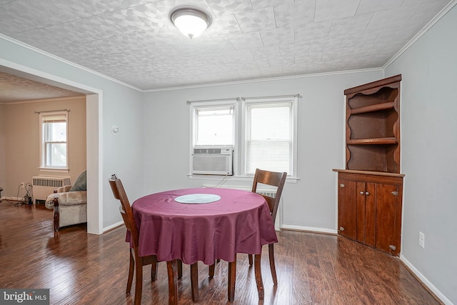 328 Spruce St, Bridgeton, NJ 08302 - dining space with radiator, wood finished floors, plenty of natural light, and crown molding