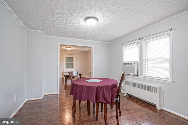 328 Spruce St, Bridgeton, NJ 08302 - dining area with radiator, ornamental molding, wood finished floors, an ornate ceiling, and cooling unit
