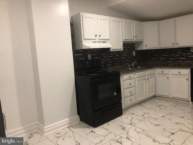308 E 23rd St, Wilmington, DE 19802 - kitchen with black electric range, under cabinet range hood, light marble finish floors, tasteful backsplash, and white cabinets