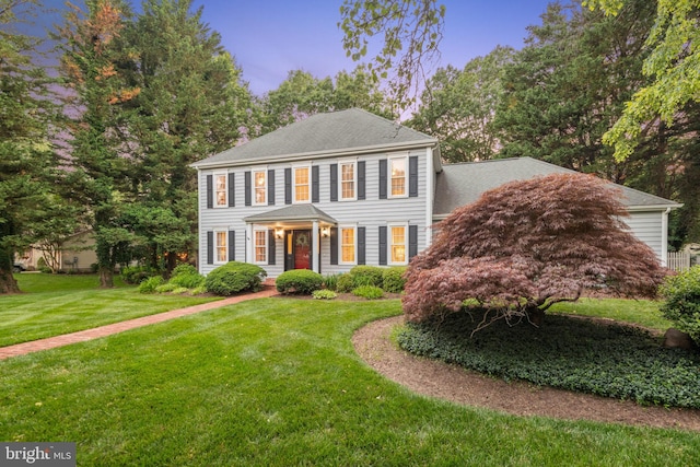 1092 Carriage Hill Pkwy, Annapolis, MD 21401 - colonial house featuring a front yard
