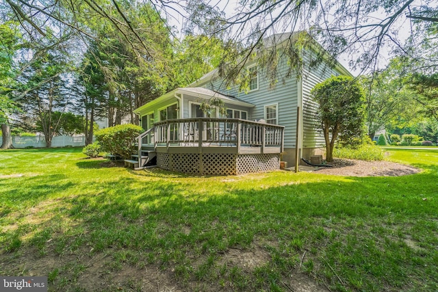 1092 Carriage Hill Pkwy, Annapolis, MD 21401 - back of property with a deck and a yard
