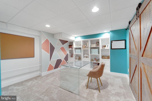 1092 Carriage Hill Pkwy, Annapolis, MD 21401 - carpeted home office with a barn door, a paneled ceiling, and recessed lighting