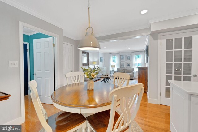 1092 Carriage Hill Pkwy, Annapolis, MD 21401 - dining space featuring light wood-type flooring, crown molding, and recessed lighting