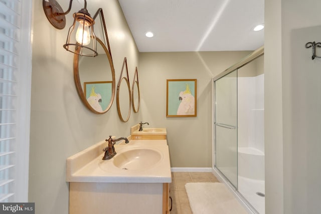 1092 Carriage Hill Pkwy, Annapolis, MD 21401 - bathroom featuring tile patterned floors, double vanity, an enclosed shower, and recessed lighting