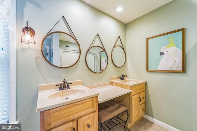 1092 Carriage Hill Pkwy, Annapolis, MD 21401 - full bathroom with two vanities, tile patterned flooring, and recessed lighting