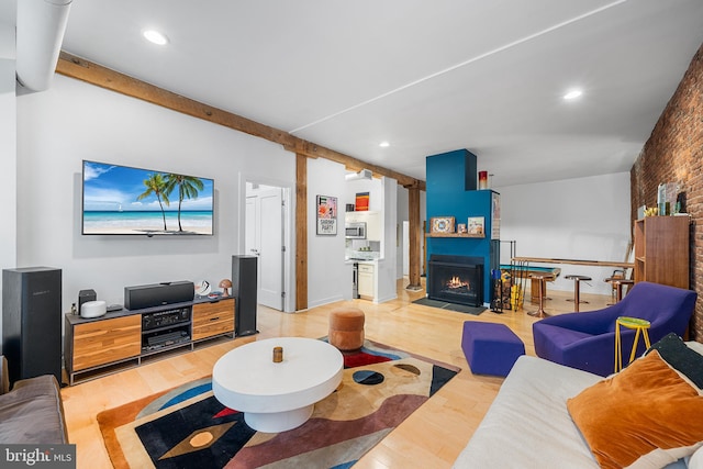 114 Naudain St Unit A, Philadelphia, PA 19147 - living room featuring light wood-type flooring, a large fireplace, and recessed lighting