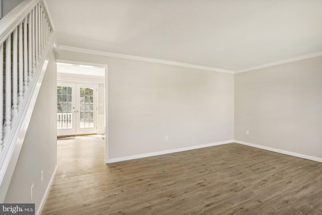 549 Madison Ave, Warminster, PA 18974 - empty room with crown molding, wood finished floors, and french doors