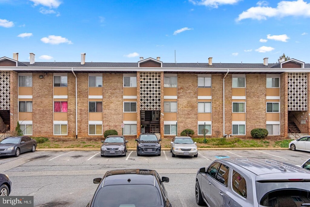 546 Wilson Bridge Dr Unit 6747C-1, Oxon Hill, MD 20745 - view of apartment building / complex with uncovered parking