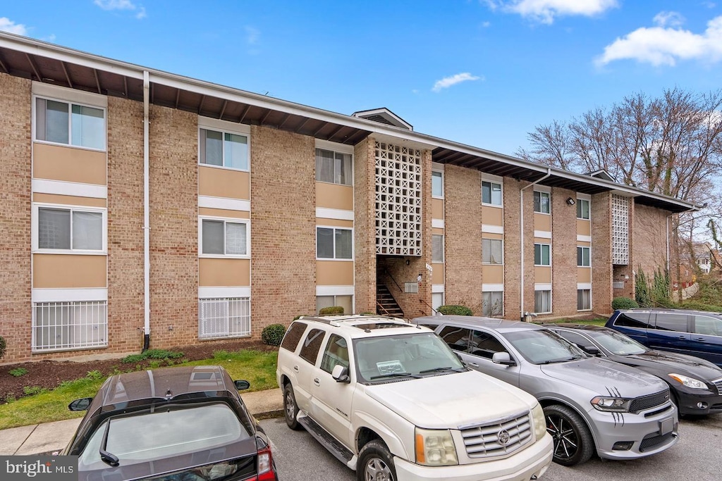 546 Wilson Bridge Dr Unit 6747C-1, Oxon Hill, MD 20745 - view of apartment building / complex with uncovered parking