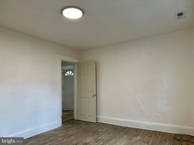 515 Dorsey, Essex, MD 21221 - unfurnished room featuring baseboards and wood finished floors