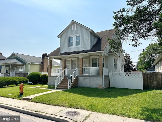 515 Dorsey, Essex, MD 21221 - view of front of property with a porch, brick siding, and a shingled roof