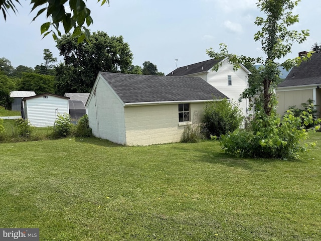 1027 E Washington St, Strasburg, VA 22657 - view of grassy yard with a storage unit