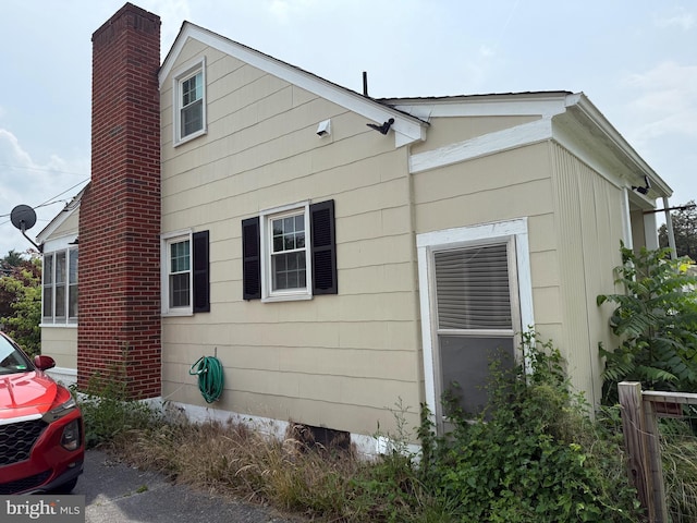 1027 E Washington St, Strasburg, VA 22657 - view of property exterior with a chimney