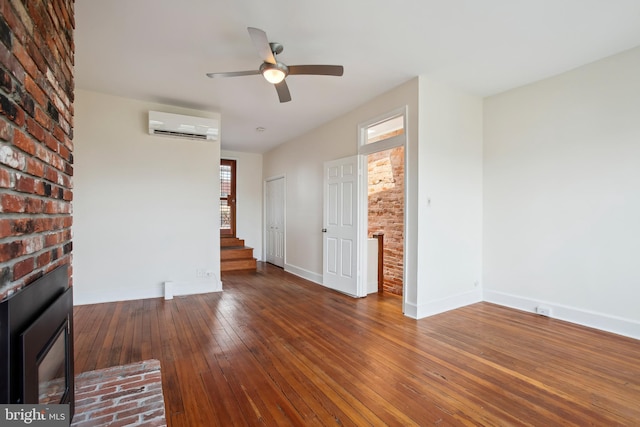 1240 Girard St NW, Washington, DC 20009 - unfurnished living room with an AC wall unit, ceiling fan, stairs, hardwood / wood-style flooring, and healthy amount of natural light