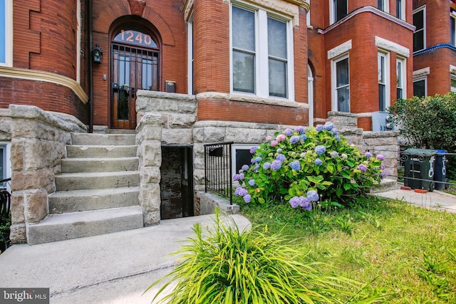1240 Girard St NW, Washington, DC 20009 - view of exterior entry featuring brick siding and stone siding